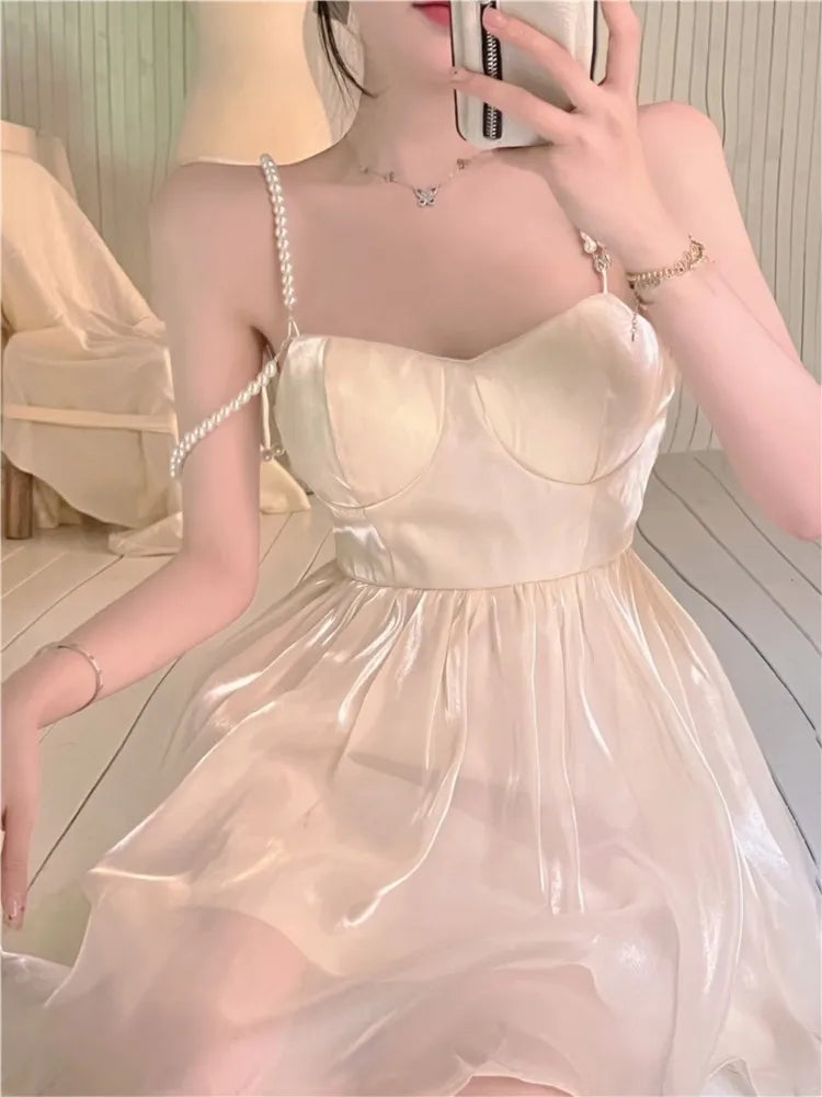 Advbridge Sweet Backless Solid Mini Dress Women Spaghetti Strap Summer A-line High Waist Holiday Beach Party Sexy One Piece Vestidos New Fashionable Mini Dress with Slits