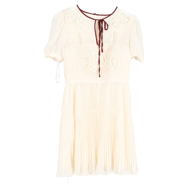 Self-Portrait Pleated Macramé-Trim Mini Dress in White Polyester Elegant Floral-Print Mini Dress